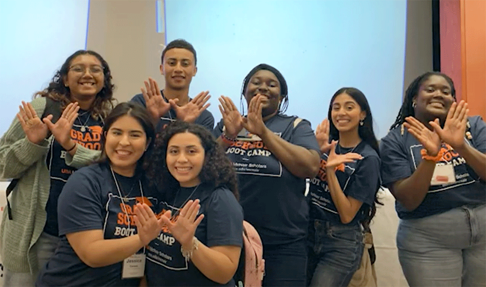 Trio group of students showing wings up