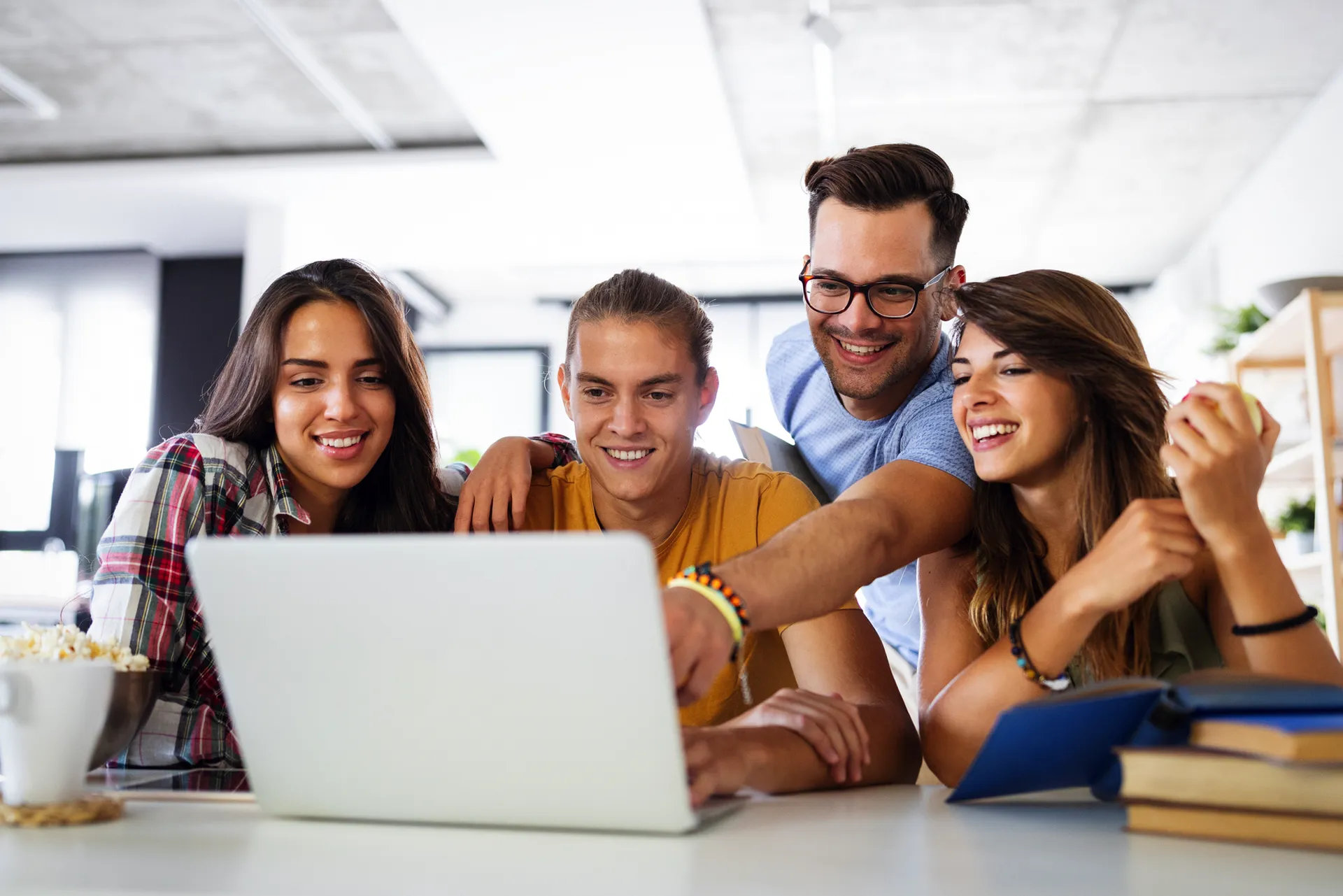 Diverse college students engaged in group study and classroom learning, representing the collaborative and accessible education offered by the most affordable colleges in Texas.