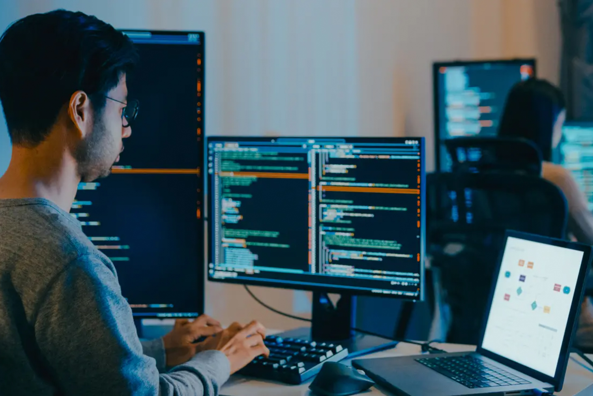 OLLU cybersecurity student coding during Cybersecurity Awareness Month