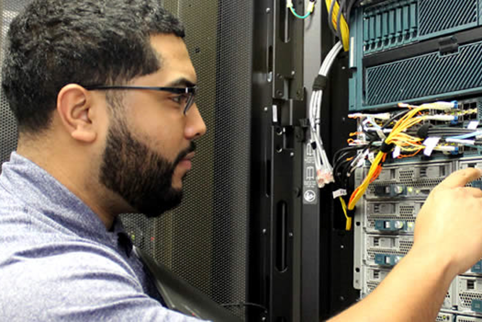 Graduate student learning advanced cybersecurity specializations at OLLU