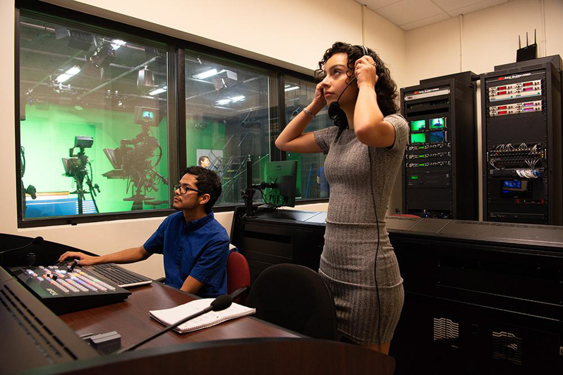 Student working in a campus production room at OLLU, supported by small classes and an 11:1 faculty–student ratio