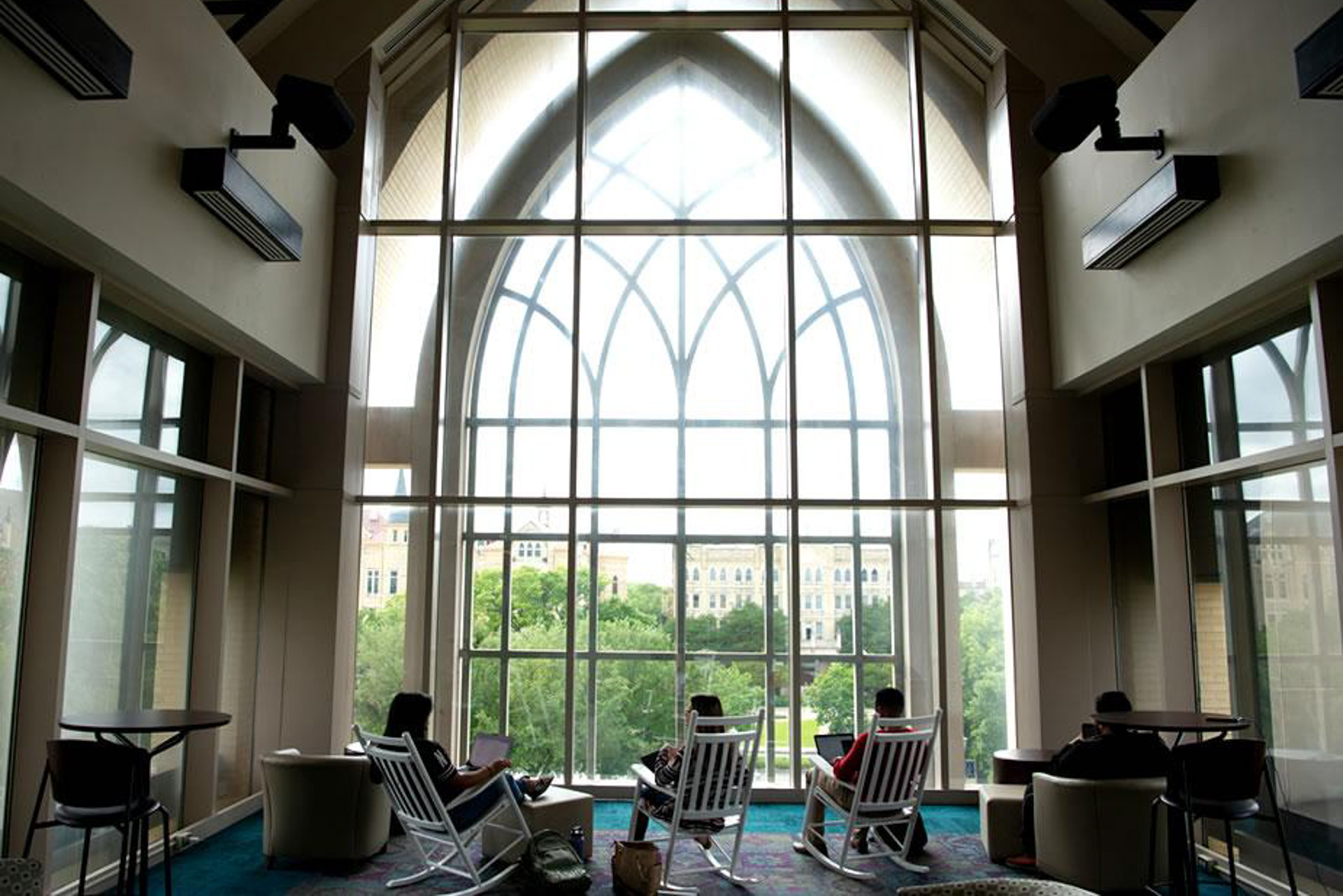 local_roi_lg Students studying in OLLU’s Sueltenfuss Library with large arched windows, showcasing the university’s role among San Antonio colleges.