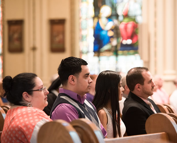 Staff and students in mass 