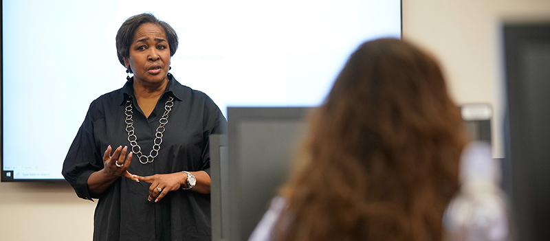 Professors standing lecturing class