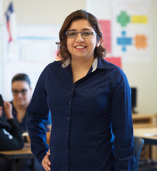 Female student smiling in classroom