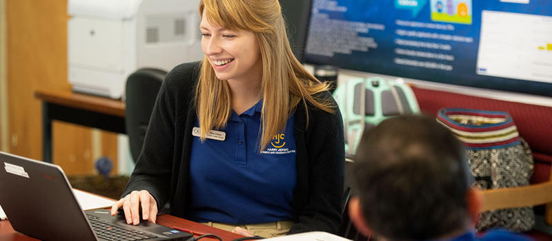 Jersig Center staff member on computer 