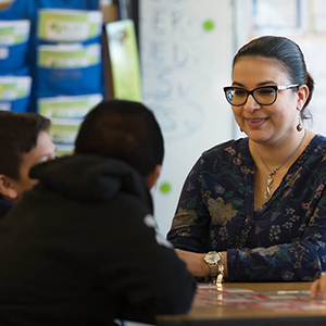 Teacher talking to students