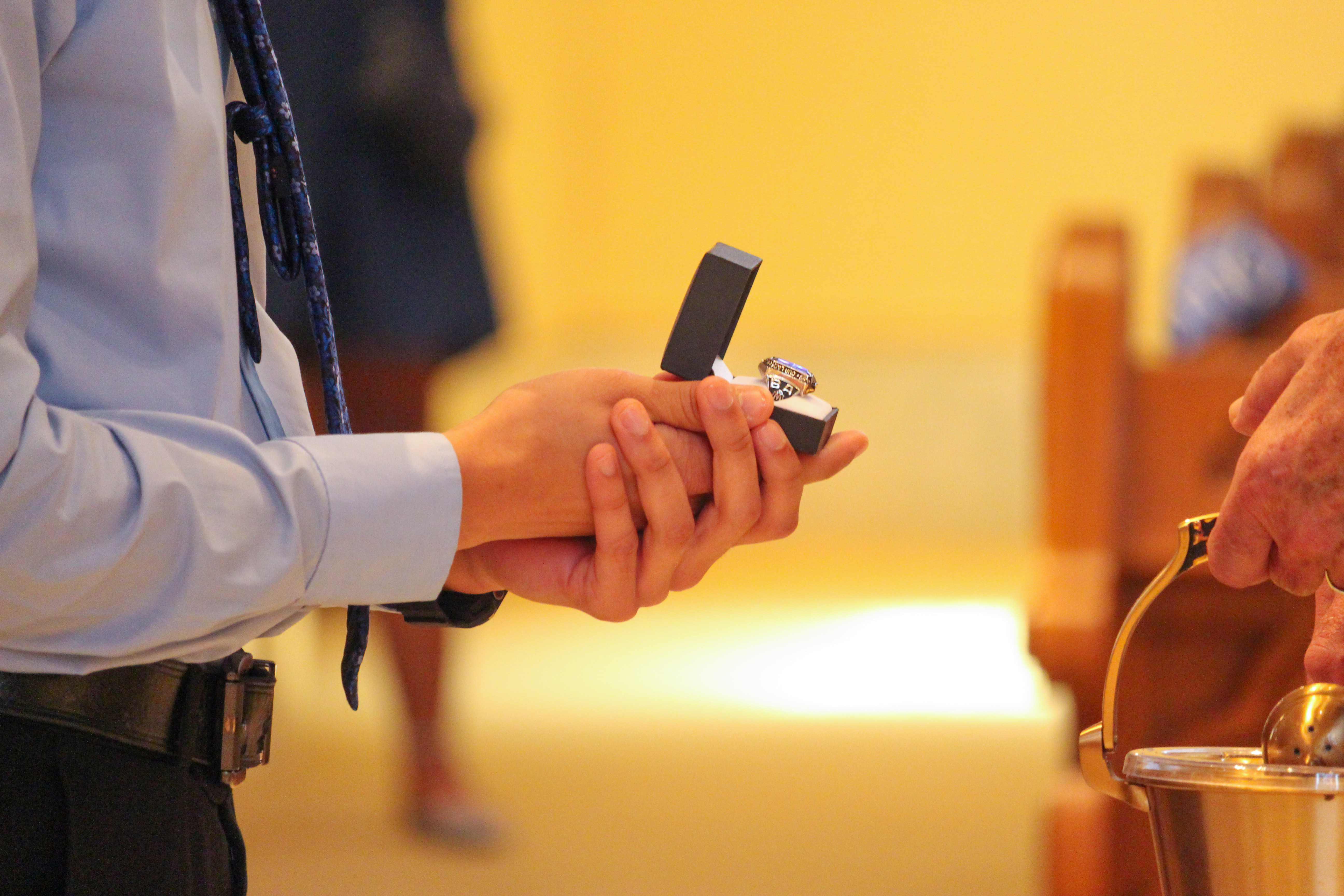 close up shot of ring during ring blessing ceremony