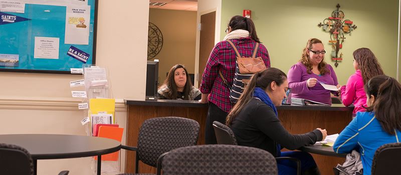 Registrar's Office staff assisting students