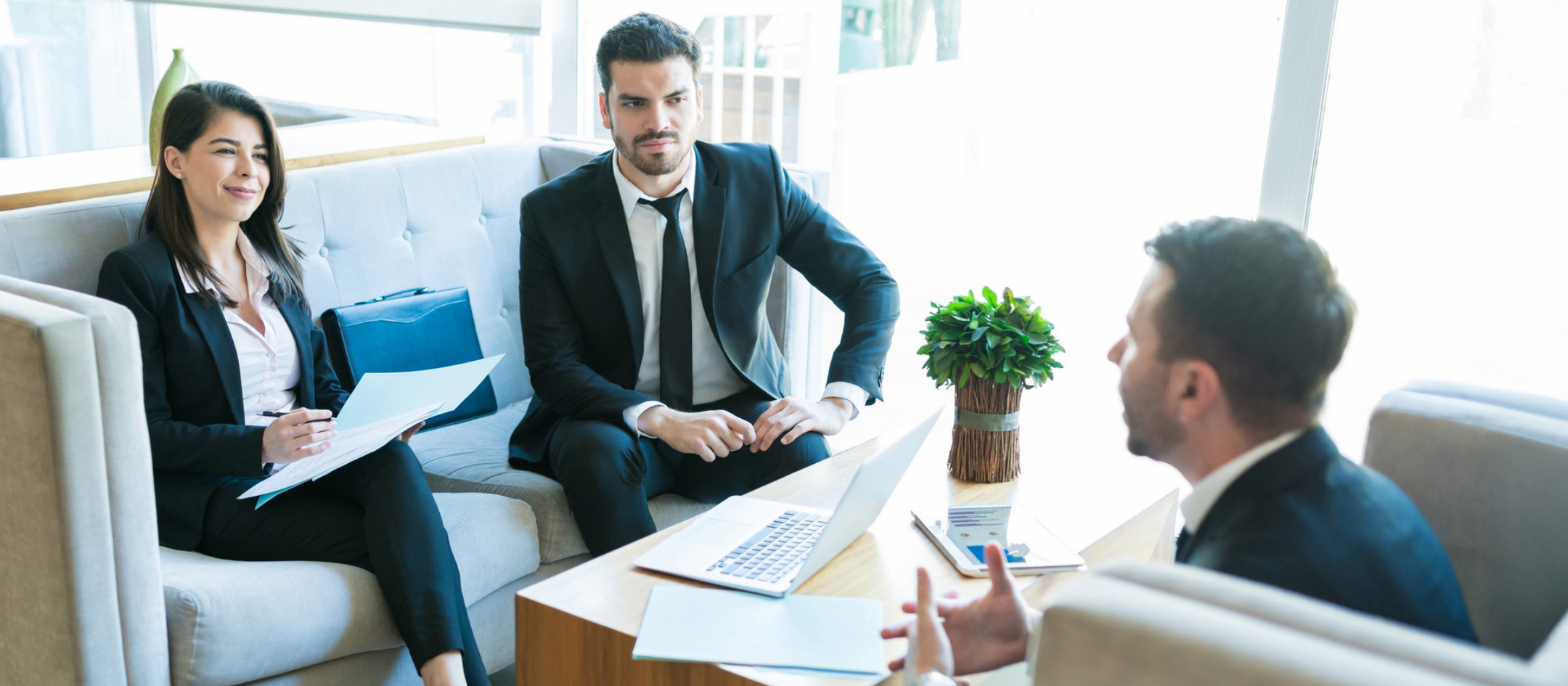 Professional executives engaged in a business meeting
