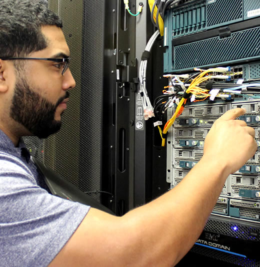 Male student working on server