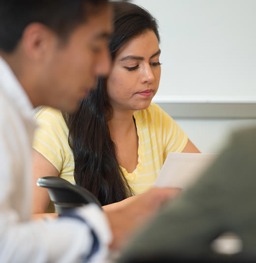 Female student sits in class