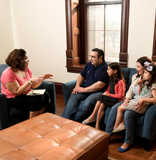 Family in session with social worker